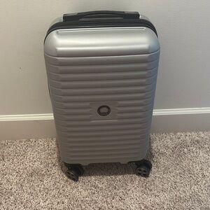 Delsey NWT Silver Hardshell Spinner Suitcase Carry On